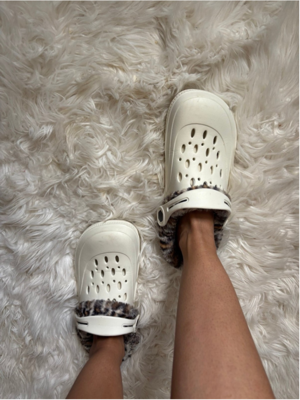 Well worn woman's house slipper fur shoes
